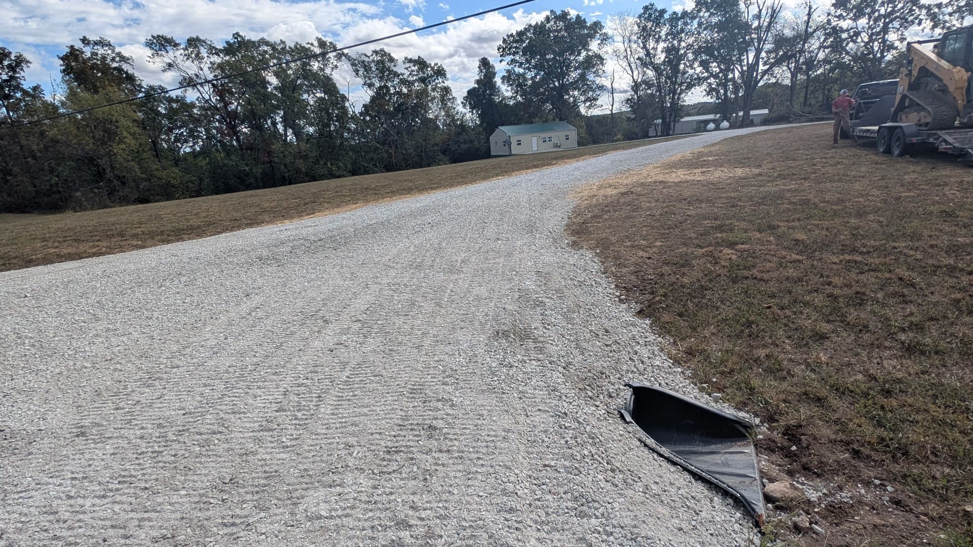 40-Foot Gravel Driveway Installation with Culvert Aprons image