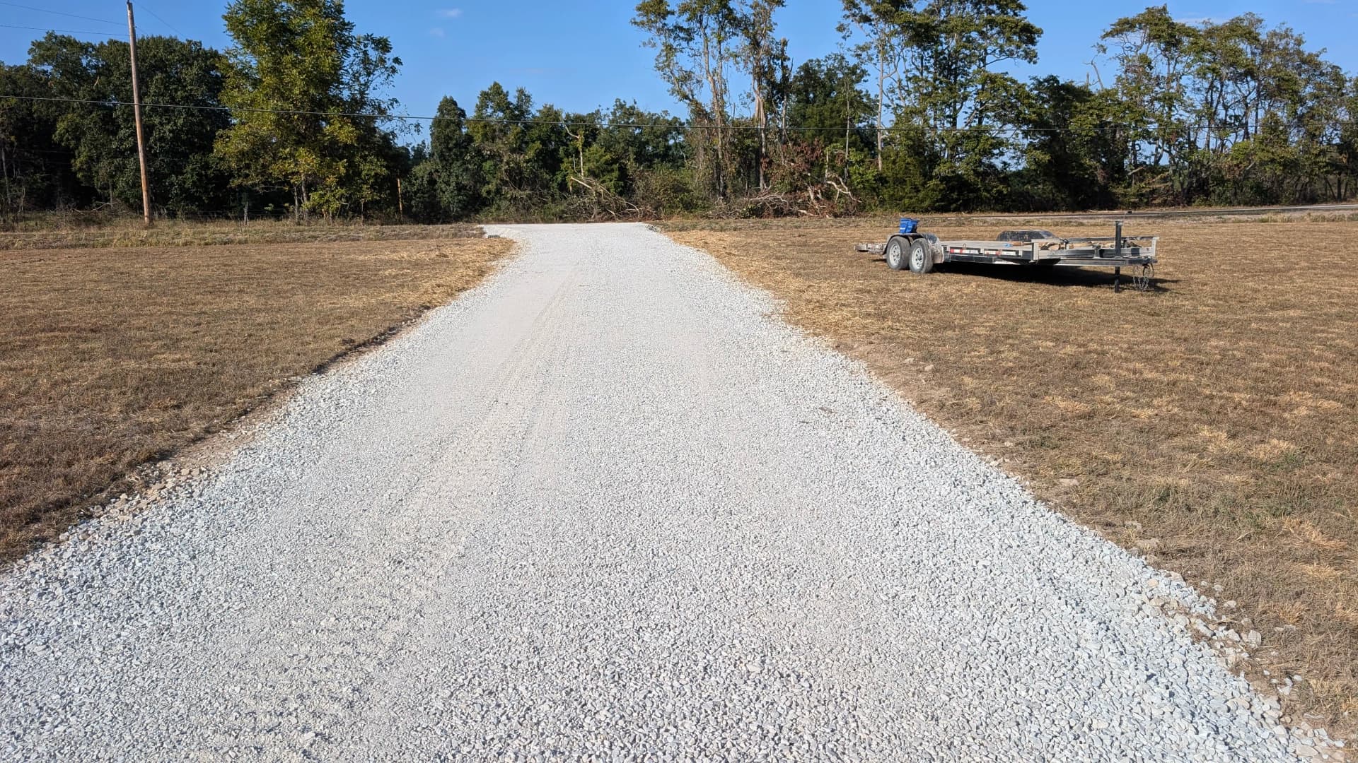 New Gravel Driveway Installation Nearly Complete on Rural Property image