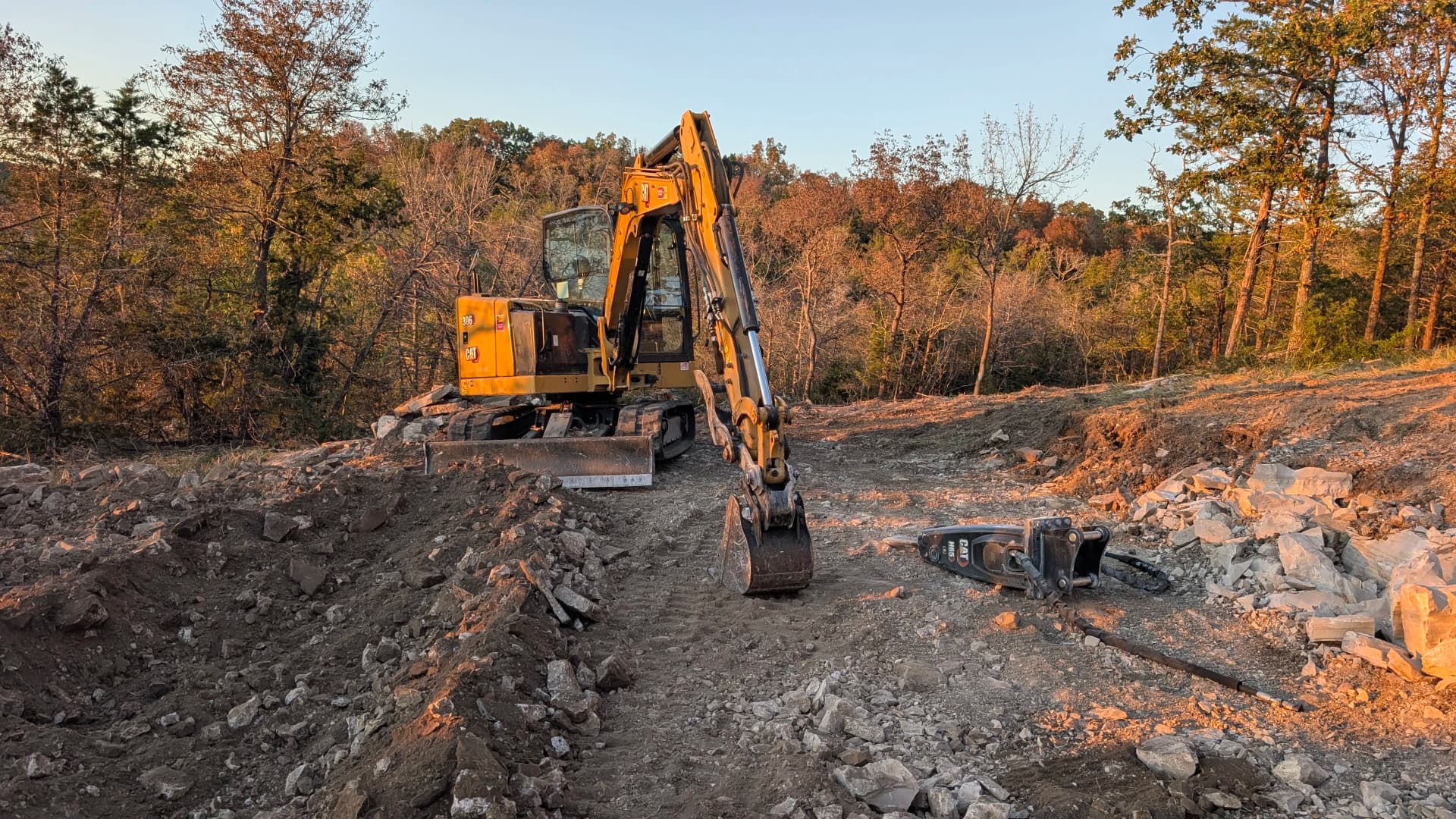Gallery photos for Busting Ledge Rock for a Lakefront Retaining Wall Build: Image #1