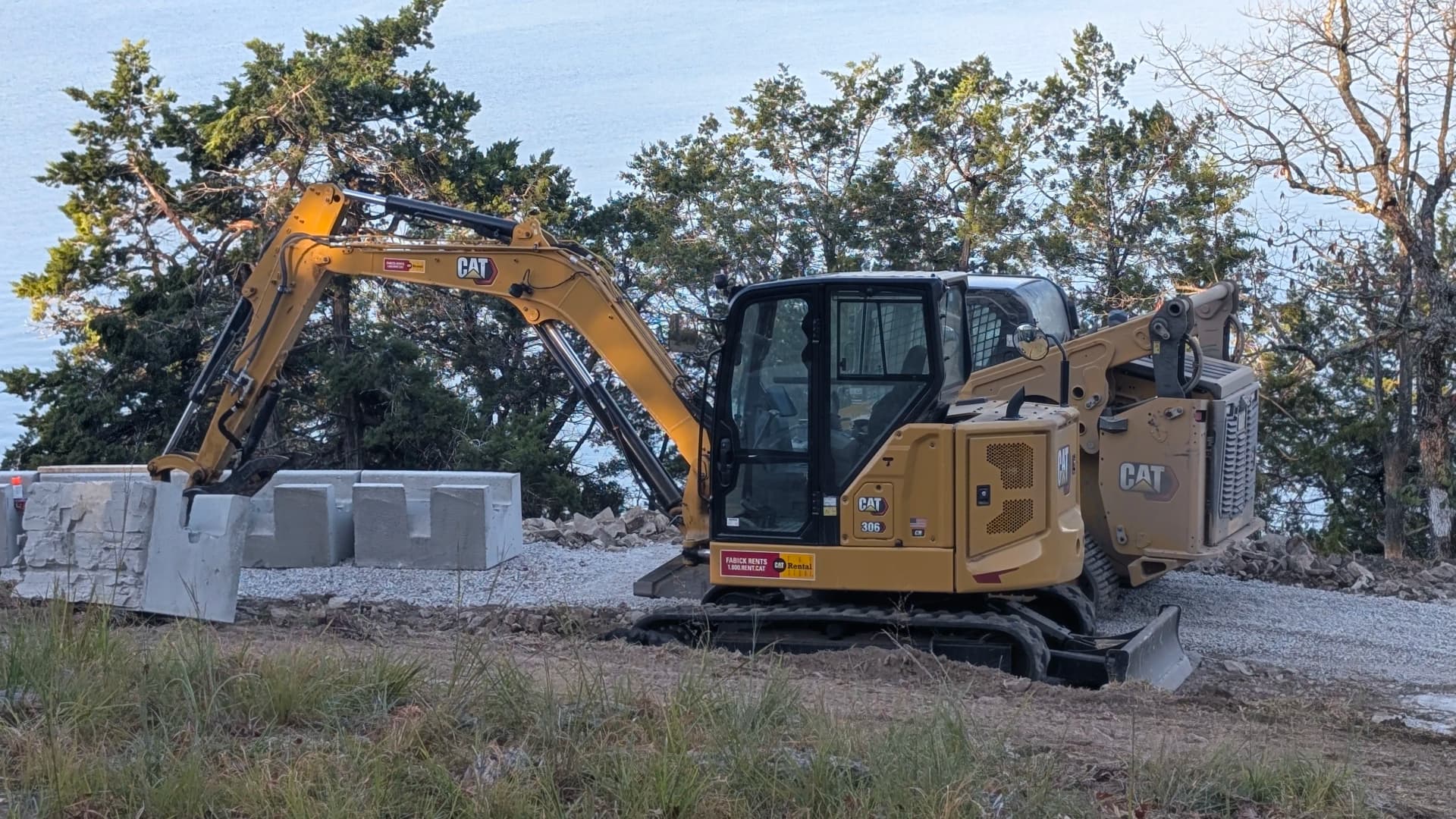 Retaining Wall Build in Progress - First Blocks Are Down image
